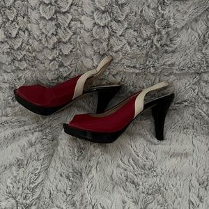 Sling black peep toe multi color heels.